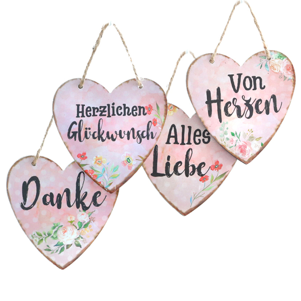 Diese rosa Herzschilder mit Spruch sind aus Blech. Die Blechschilder haben ein Juteband zum Aufhängen. Ein Set mit 4 verschiedenen Gartenschilder. Die Sprüche lauten DANKE, HERZLICHEN GLÜCKWUNSCH, ALLES LIEBE, VON HERZEN.  Ein schönes Geschenk zum Geburts