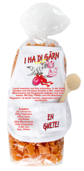 Mit dem Spruch: I ha di gärn. Die beliebten und lustigen Herz Teigwaren. Als Geschenk mit einer kleinen Mini-Schürze und einem herzigen Holzlöffeli. Inklusive Rezept auf Schürzchen. Nudeln hergestellt in der Schweiz. Pasta in Herzform,