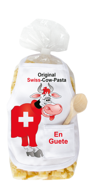 Mit dem Spruch: Original Swiss Cow Pasta. Die beliebten und lustigen Kuh Teigwaren. Als Geschenk mit einer kleinen Mini-Schürze und einem herzigen Holzlöffeli. Nudeln hergestellt in der Schweiz. Pasta in Kuhform, 400 g