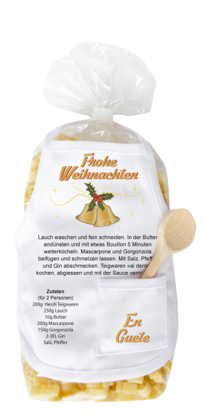 Mit dem Spruch: Frohe Weihnachten. Mit Glocken und Tannenzweigen. Die beliebten und lustigen Engel Teigwaren mit einer kleinen Mini-Schürze und einem herzigen Holzlöffeli. Inklusive Rezept auf Schürzchen. Optimal als Weihnachtsgeschenk. Nud