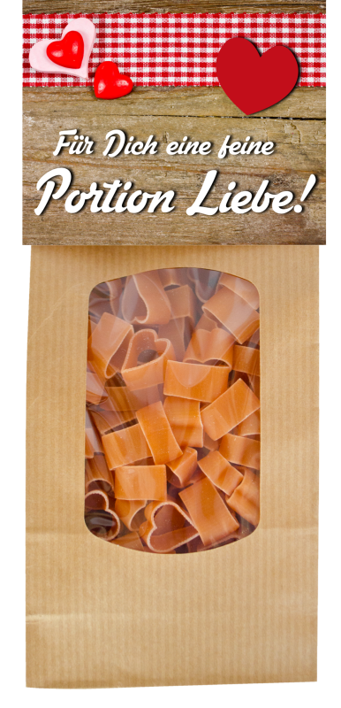 Mit dem Spruch: Für Dich eine feine Portion Liebe. Die beliebten Herz Teigwaren in einer schönen Geschenkpackung. Am Naturbeutel ist eine Etikette angebracht. Vorderseite mit Sprüchen, Rückseite mit einem feinen Pasta Rezept mit Tomate