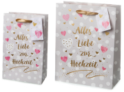 Die Geschenktasche mit Herzmotiven und dem Aufdruck «Alles Liebe zur Hochzeit». Ein Geschenksack zur Hochzeit mit vielen Herzen. Eine edle Tasche, um das Hochzeitsgeschenk zu verpacken.  Material: 210 gr. Papier Druck: matt mit goldenem Foliendruck Henkel