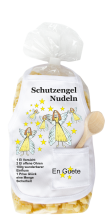 Mit dem Spruch: Schutzengel Nudeln. Die beliebten und lustigen Engel Teigwaren. Als Geschenk mit einer kleinen Mini-Schürze und einem herzigen Holzlöffeli. Inklusive Rezept auf Schürzchen. Nudeln hergestellt in der Schweiz. Pasta in Engelfo